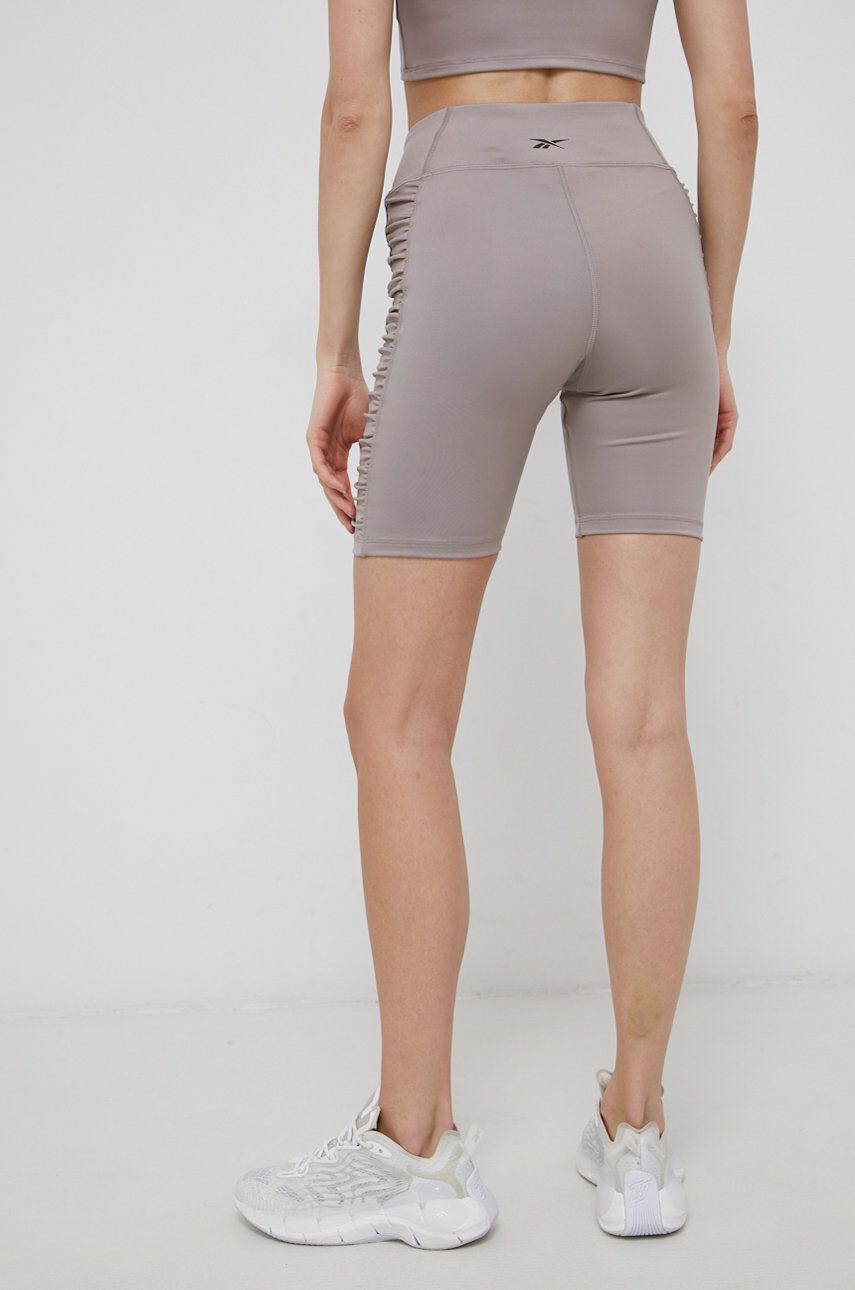 Reebok pantaloni scurți de antrenament H56373 femei culoarea galben neted high waist - Pled.ro