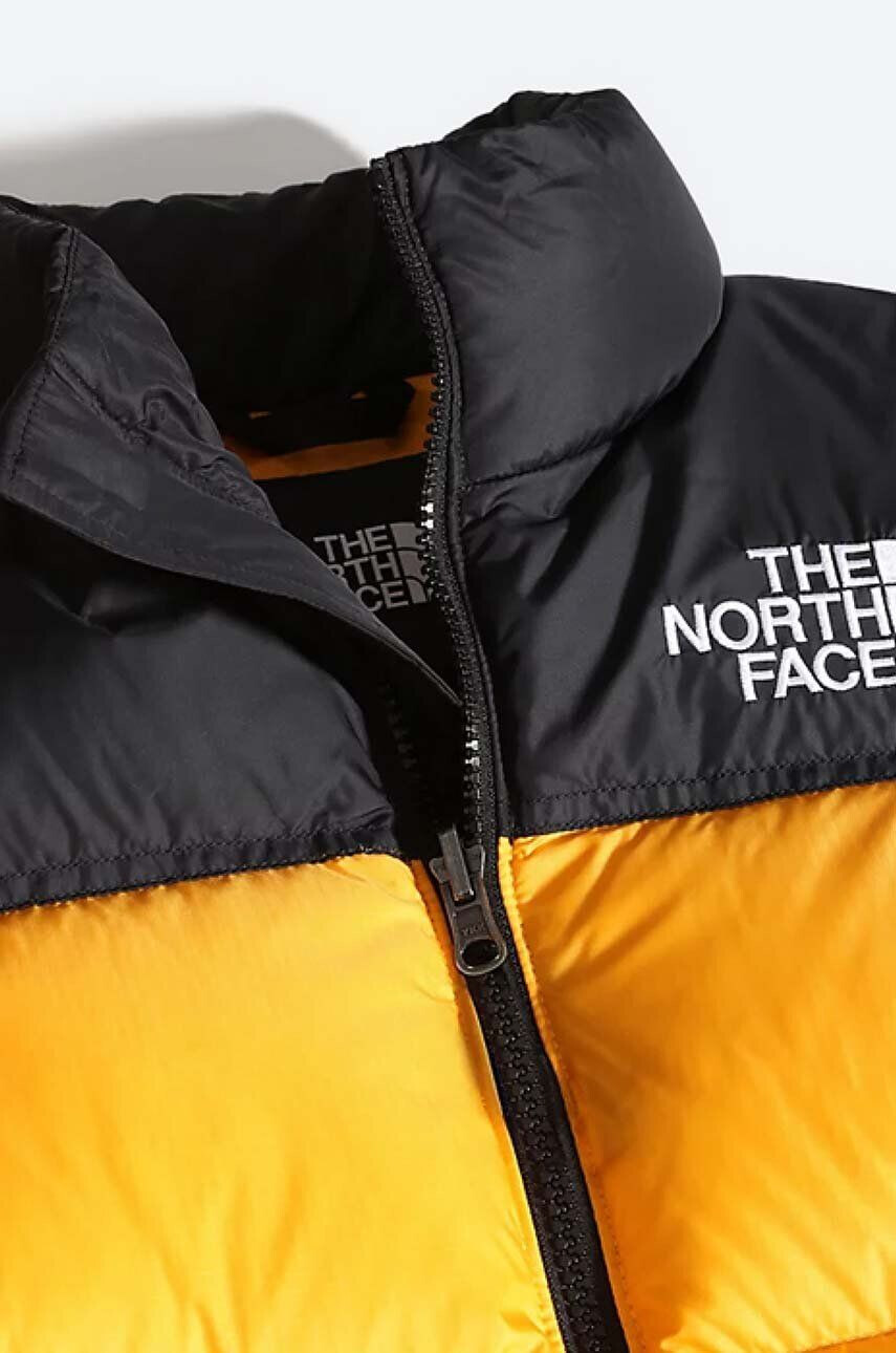 The North Face geaca de puf pentru copii Youth 1996 Retro Nuptse culoarea galben - Pled.ro