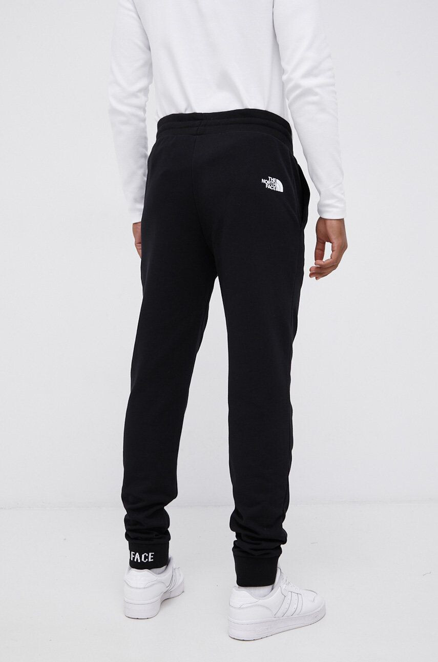 The North Face Pantaloni bărbați culoarea negru cu imprimeu - Pled.ro