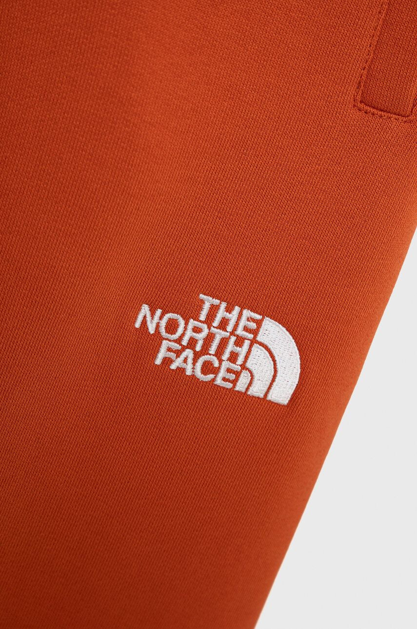 The North Face Pantaloni de bumbac pentru copii culoarea portocaliu cu imprimeu - Pled.ro