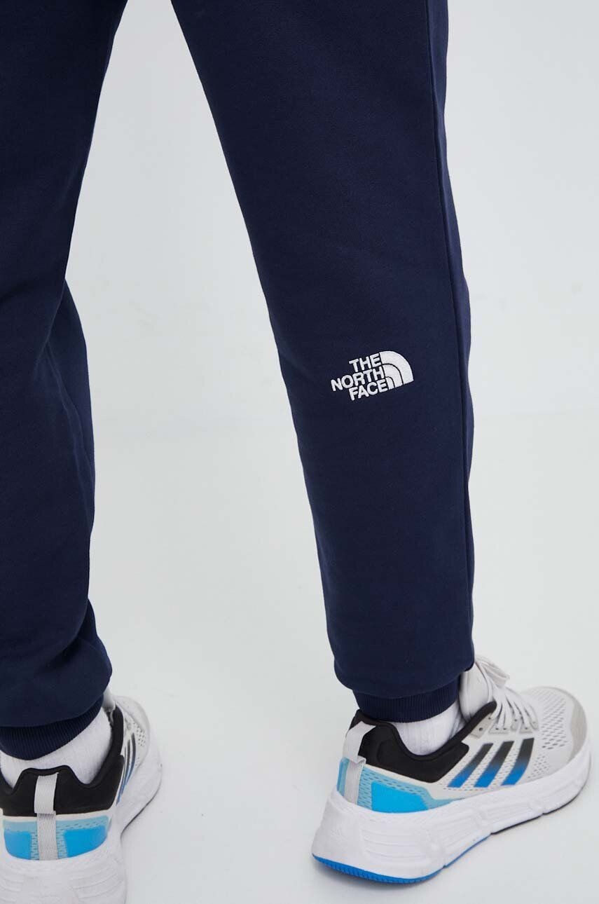 The North Face pantaloni de trening din bumbac culoarea albastru marin neted - Pled.ro