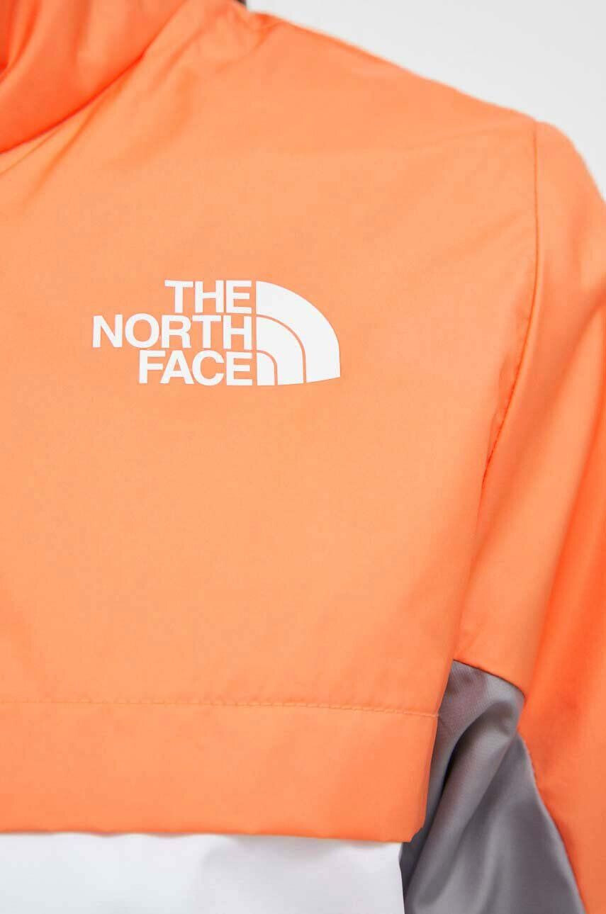 The North Face windbreaker Mountain Athletics culoarea portocaliu - Pled.ro