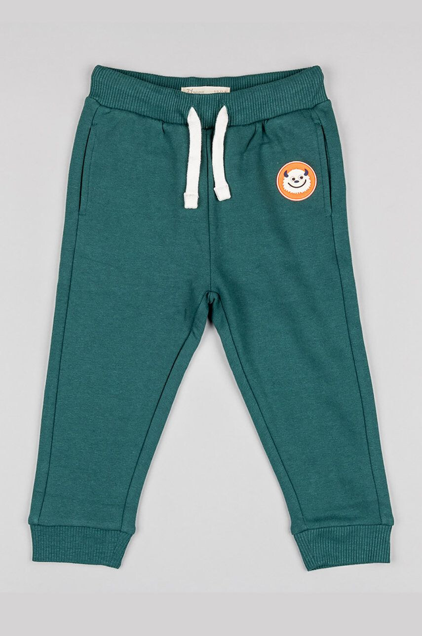 Zippy pantaloni de trening pentru copii culoarea verde cu imprimeu - Pled.ro