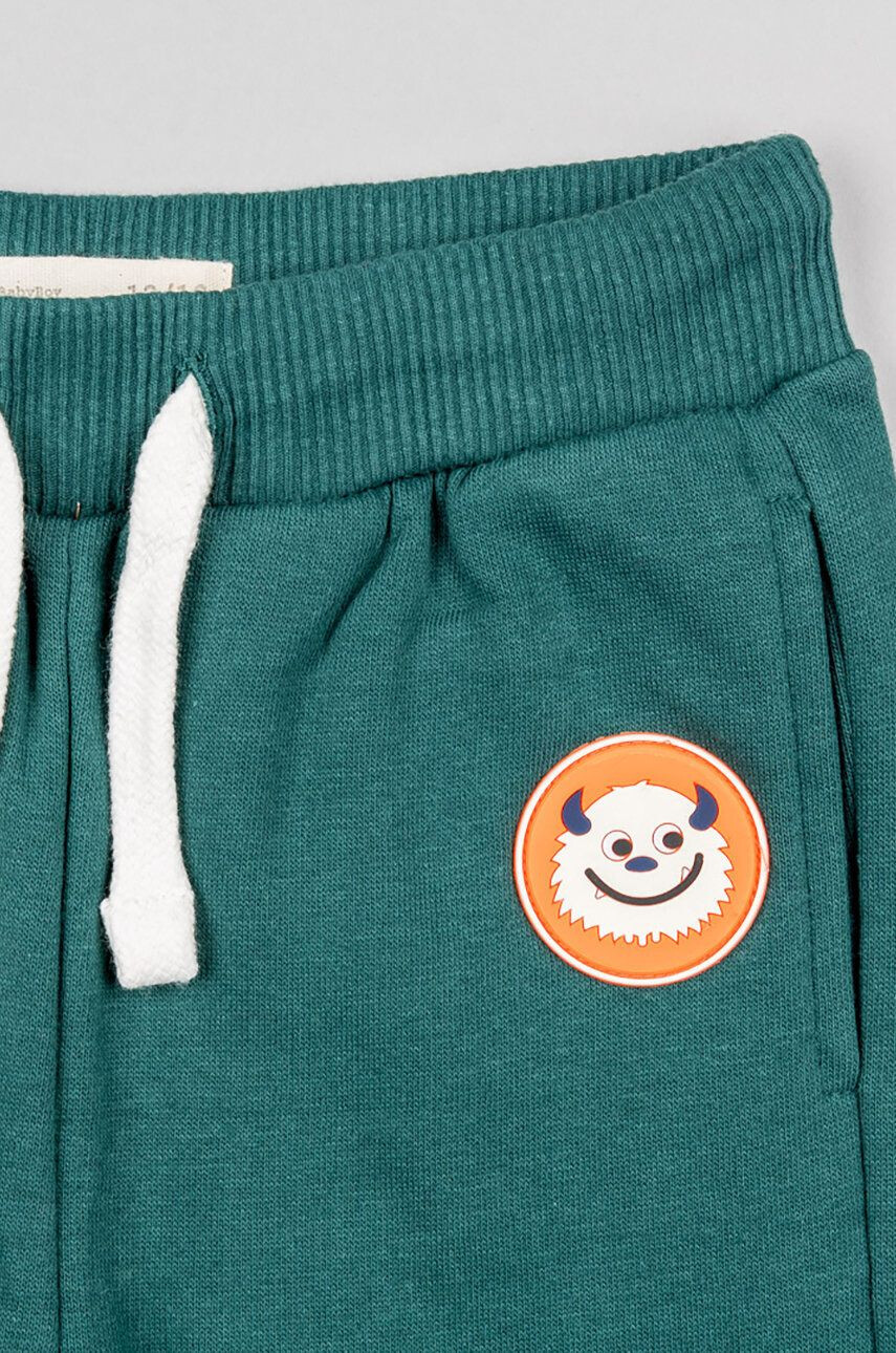 Zippy pantaloni de trening pentru copii culoarea verde cu imprimeu - Pled.ro