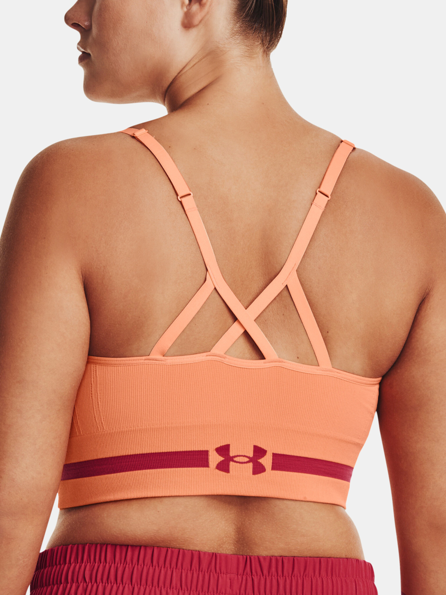 Under Armour UA Seamless Low Long Sport Sutien Portocaliu - Pled.ro