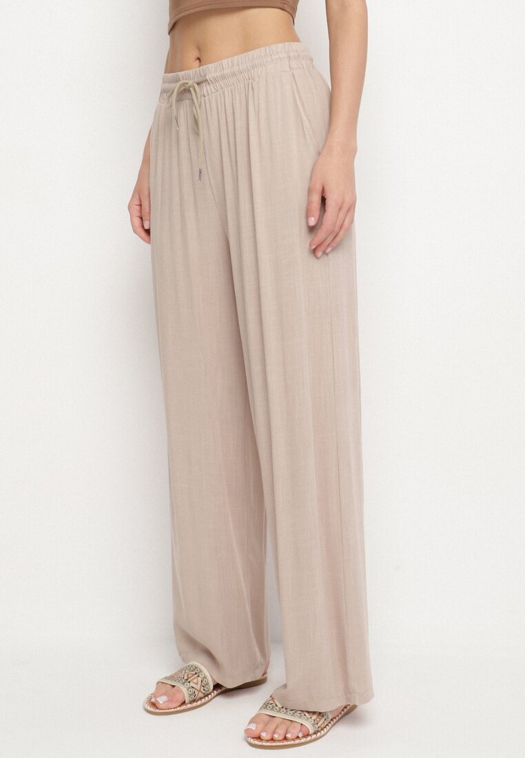 defox Pantaloni Bej de bumbac cu elastic în talie cu o croială lejeră Efraia
