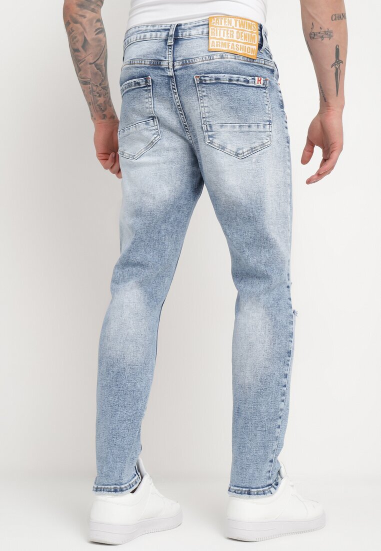  Jeans Albaștri de bumbac cu croială mulată cu rupturi și găuri Agistrea