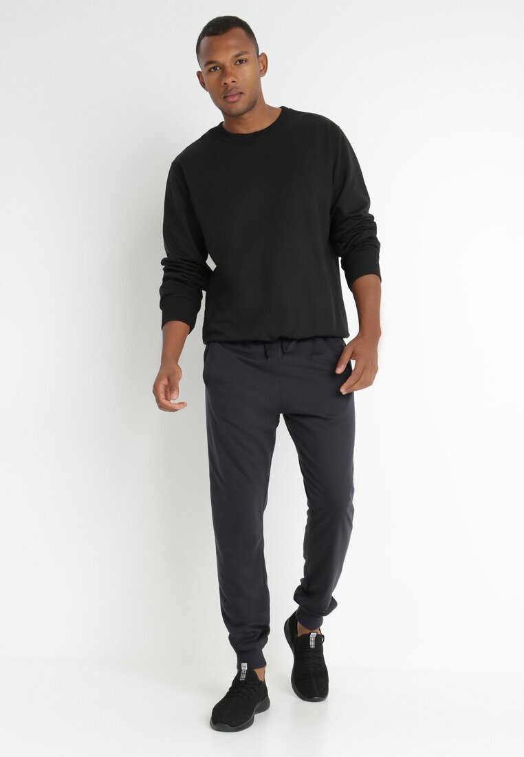  Pantaloni de trening granat joggeri Analía