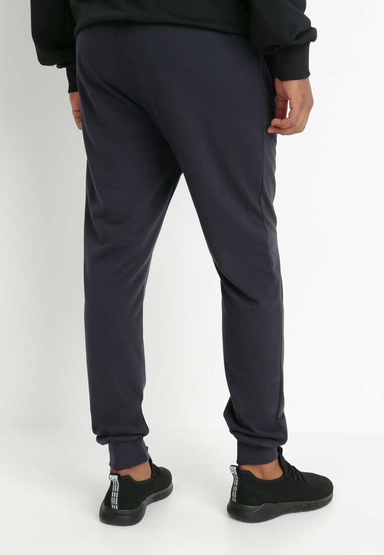  Pantaloni de trening granat joggeri Analía