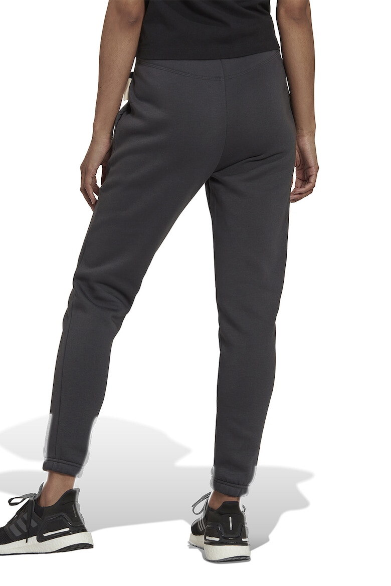 adidas Sportswear Pantaloni conici din amestec de bumbac organic cu buzunare laterale - Pled.ro