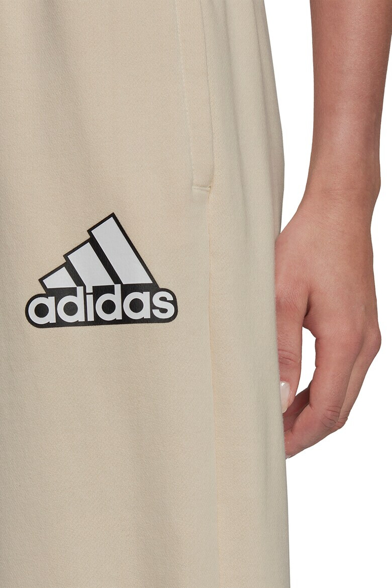 adidas Sportswear Pantaloni sport lejeri cu buzunare laterale Essentials - Pled.ro