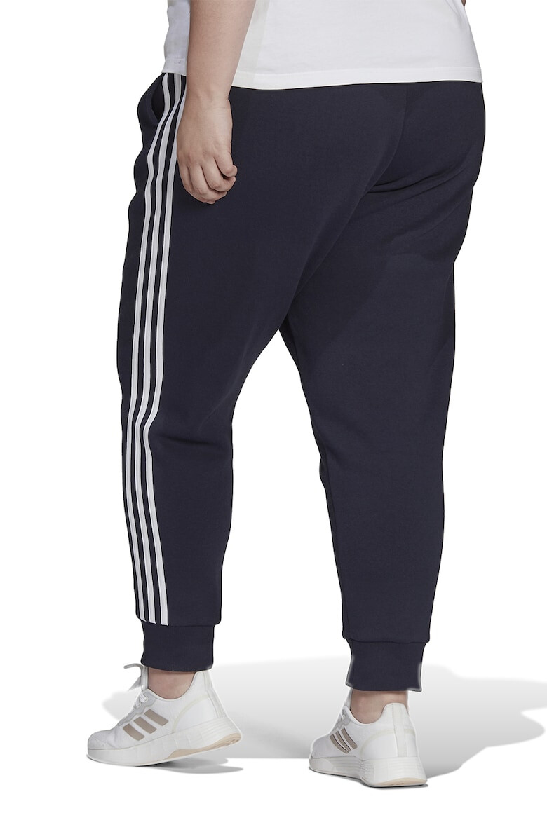 adidas Sportswear Pantaloni sport slim fit cu croiala conica si 3 dungi Essentials - Pled.ro