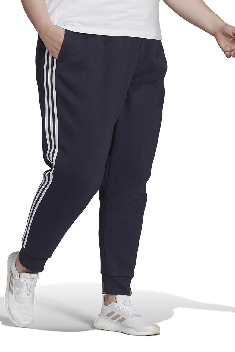 adidas Sportswear Pantaloni sport slim fit cu croiala conica si 3 dungi Essentials - Pled.ro