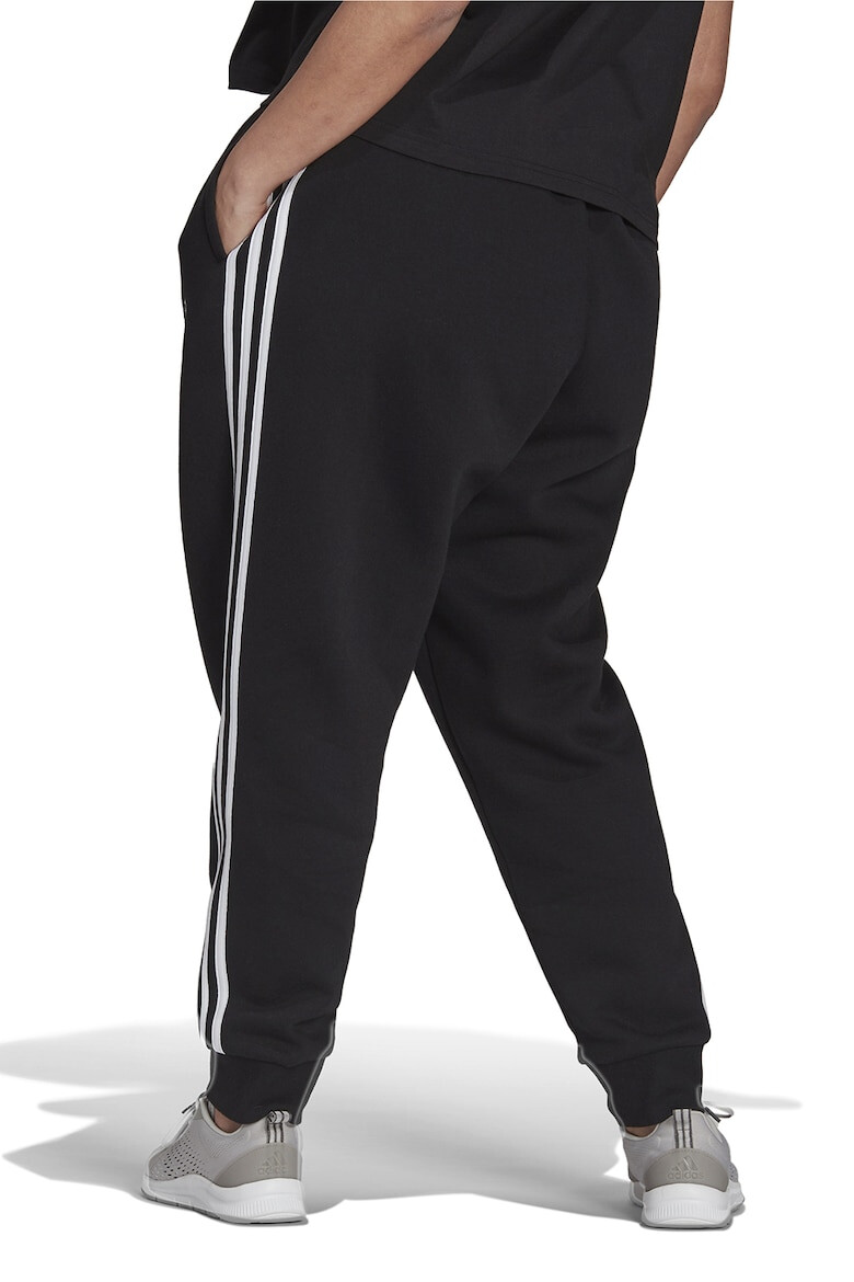 adidas Sportswear Pantaloni sport slim fit cu croiala conica si 3 dungi Essentials - Pled.ro