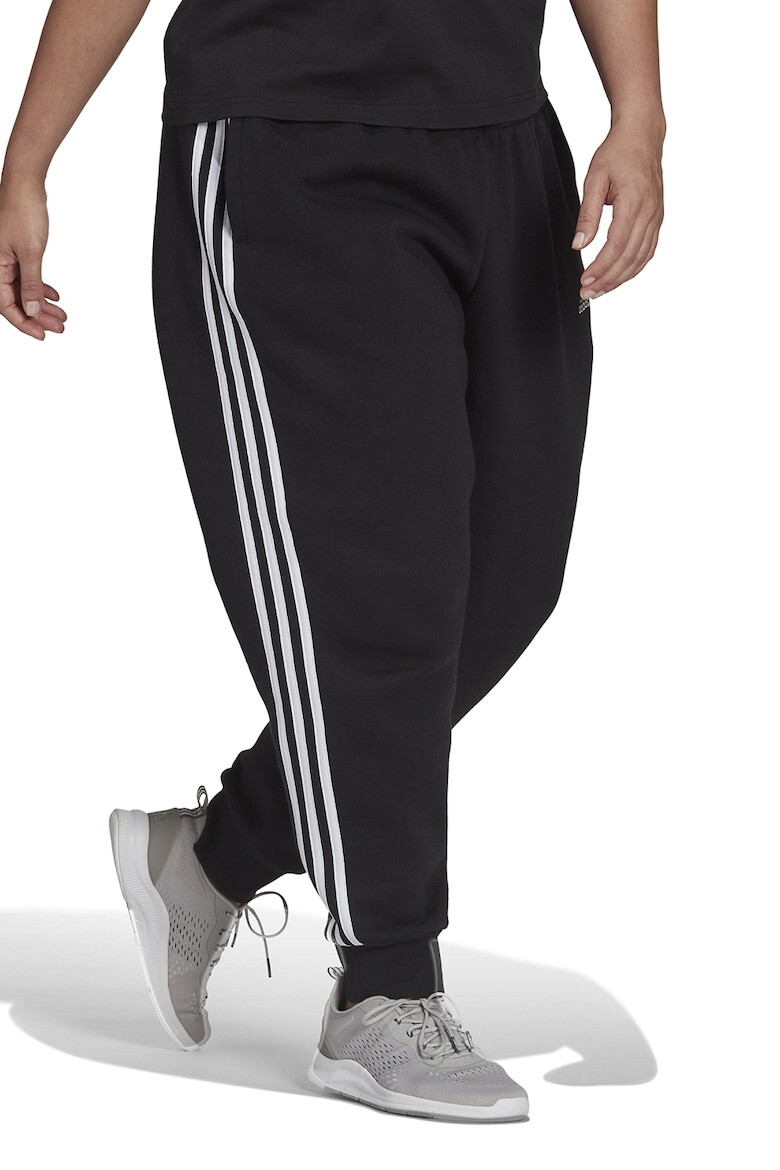 adidas Sportswear Pantaloni sport slim fit cu croiala conica si 3 dungi Essentials - Pled.ro