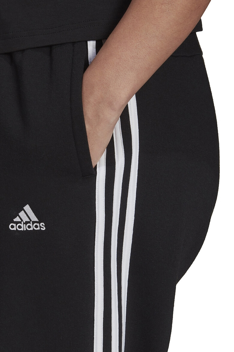 adidas Sportswear Pantaloni sport slim fit cu croiala conica si 3 dungi Essentials - Pled.ro