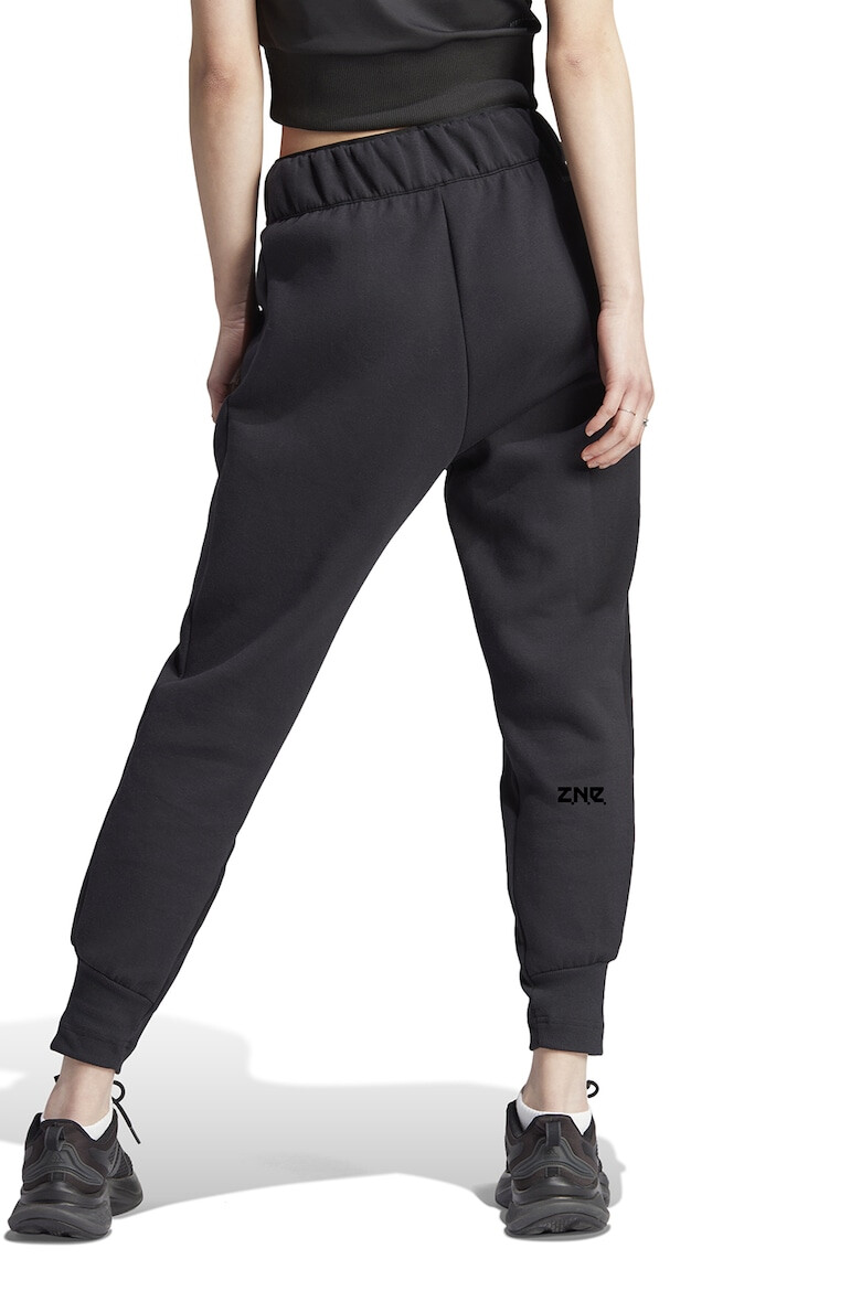 adidas Sportswear Pantaloni crop de trening cu croiala conica ZNE - Pled.ro