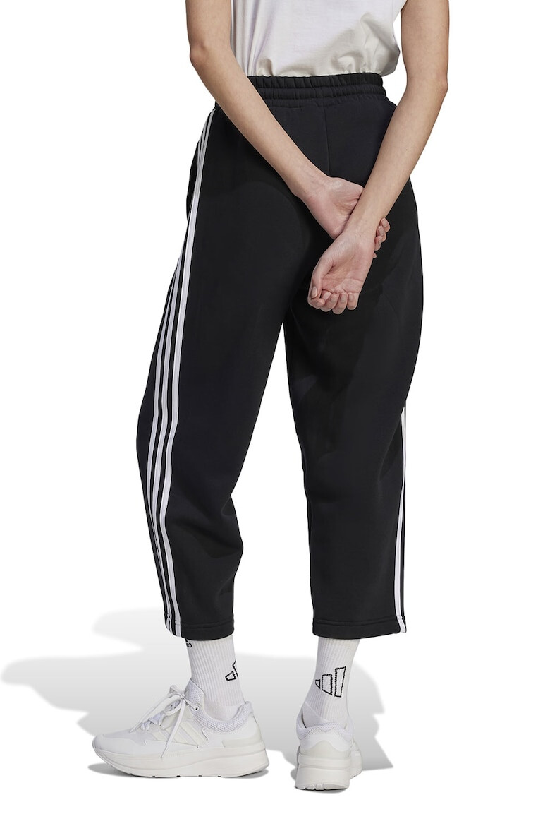 adidas Sportswear Pantaloni de trening cu 3 dungi si buzunare laterale Essenials - Pled.ro