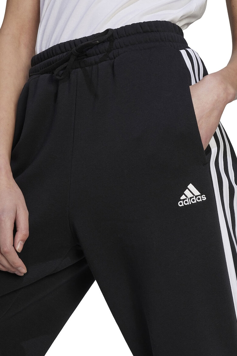 adidas Sportswear Pantaloni de trening cu 3 dungi si buzunare laterale Essenials - Pled.ro