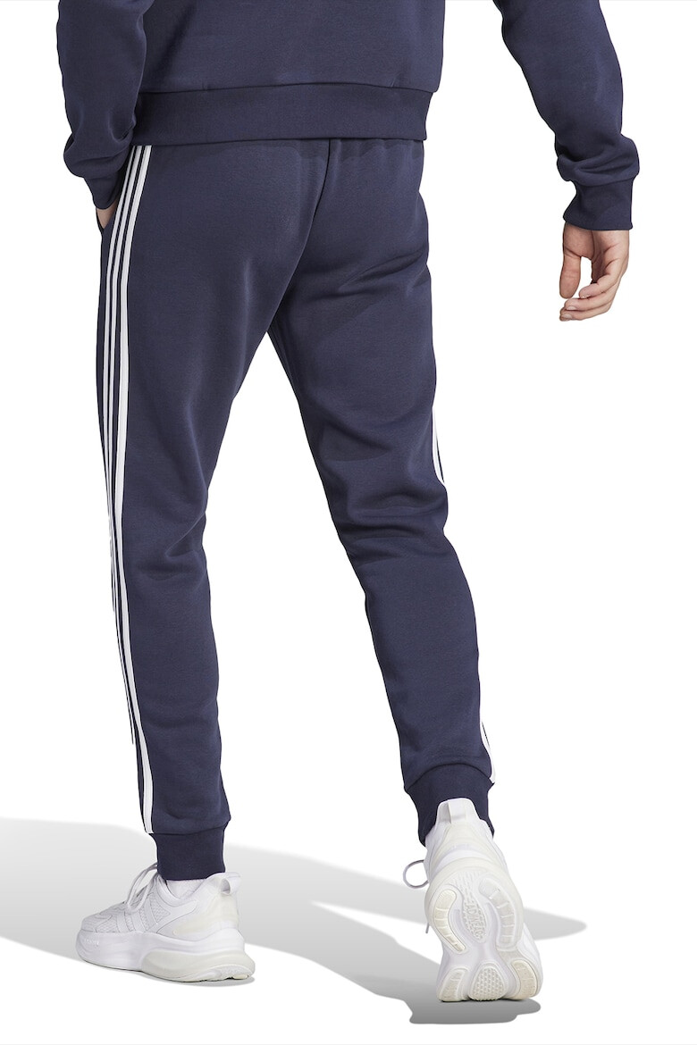 adidas Sportswear Pantaloni de trening conici cu buzunare laterale - Pled.ro