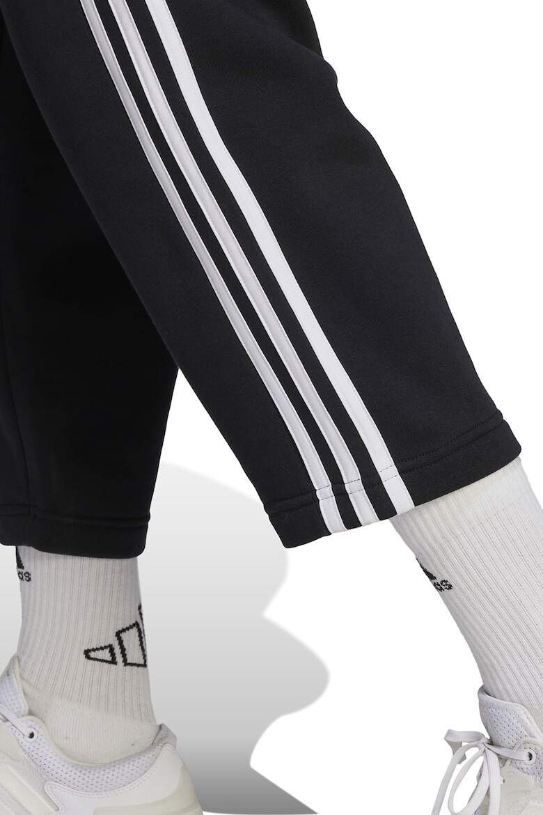 adidas Sportswear Pantaloni de trening cu 3 dungi si buzunare laterale Essenials - Pled.ro