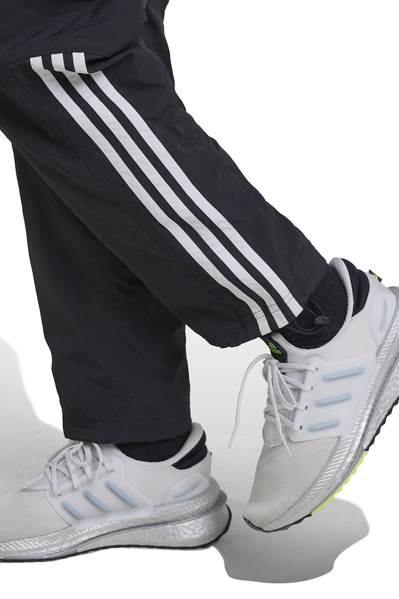 adidas Sportswear Pantaloni de trening cu buzunare cu clapa - Pled.ro