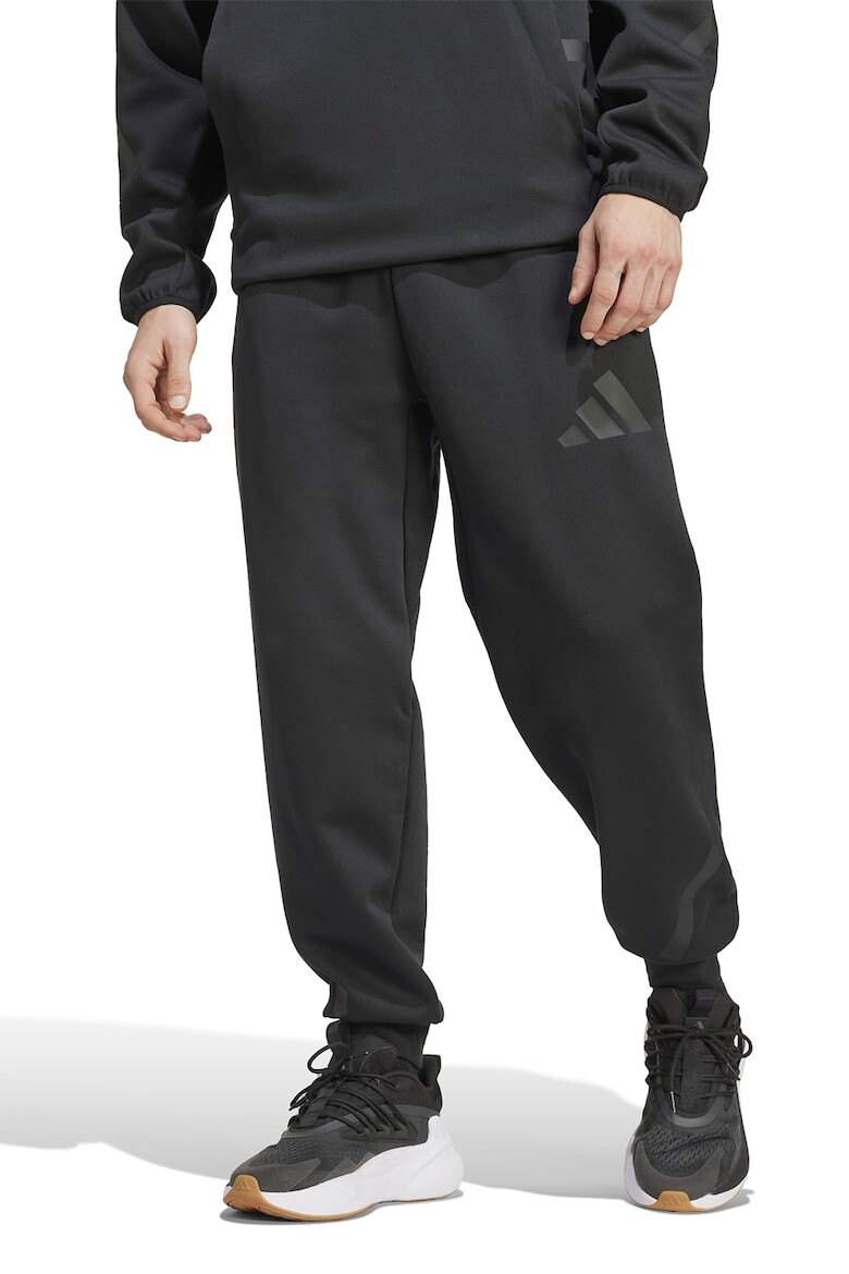 adidas Sportswear Pantaloni de trening cu buzunare cu fermoar Z.N.E. - Pled.ro