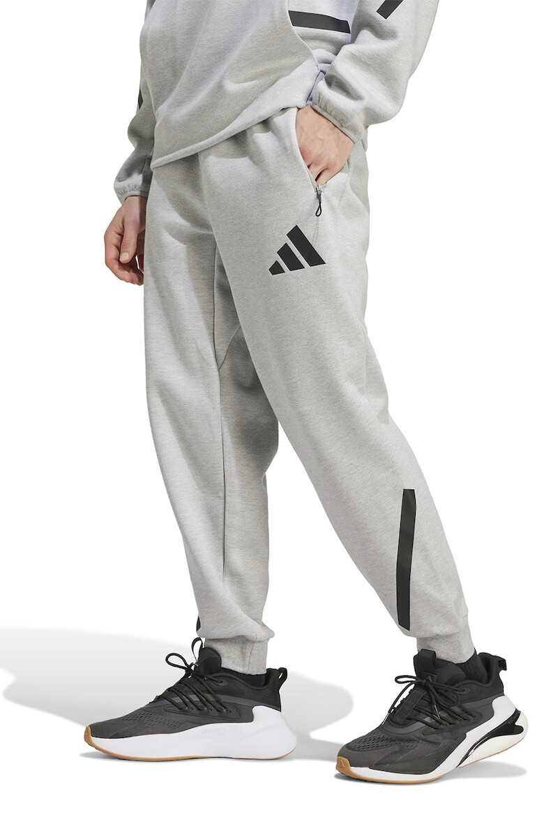 adidas Sportswear Pantaloni de trening cu buzunare cu fermoar Z.N.E. - Pled.ro