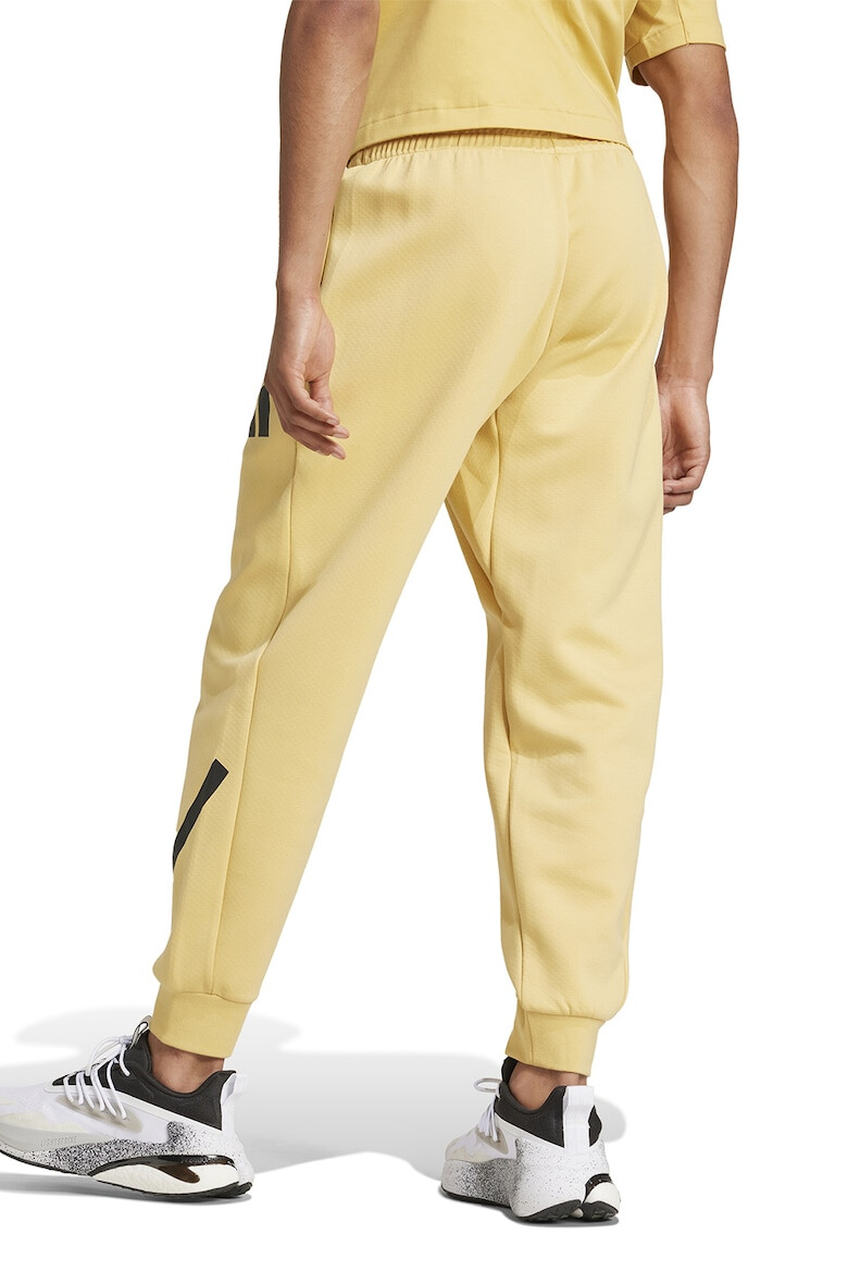 adidas Sportswear Pantaloni de trening cu buzunare cu fermoar Z.N.E. - Pled.ro