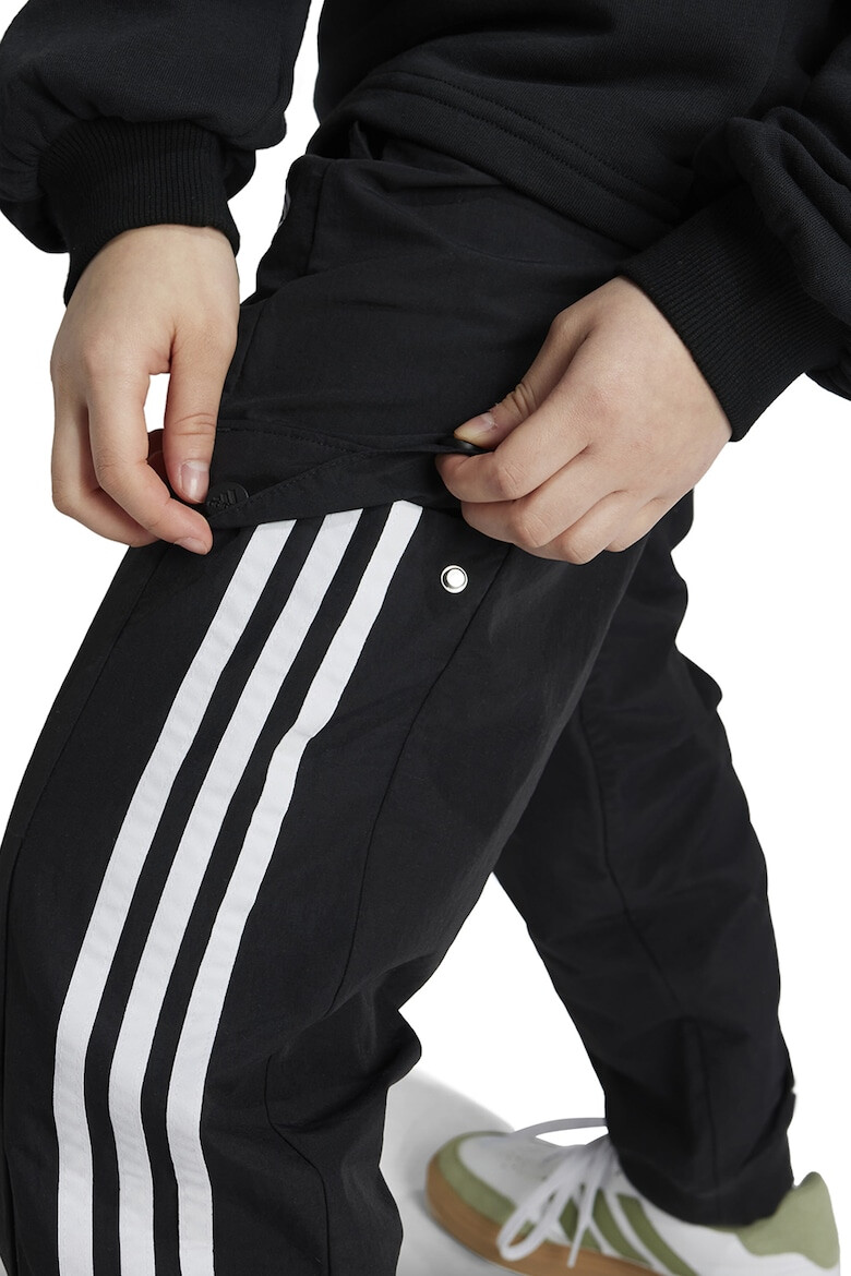 adidas Sportswear Pantaloni de trening cu buzunare laterale - Pled.ro