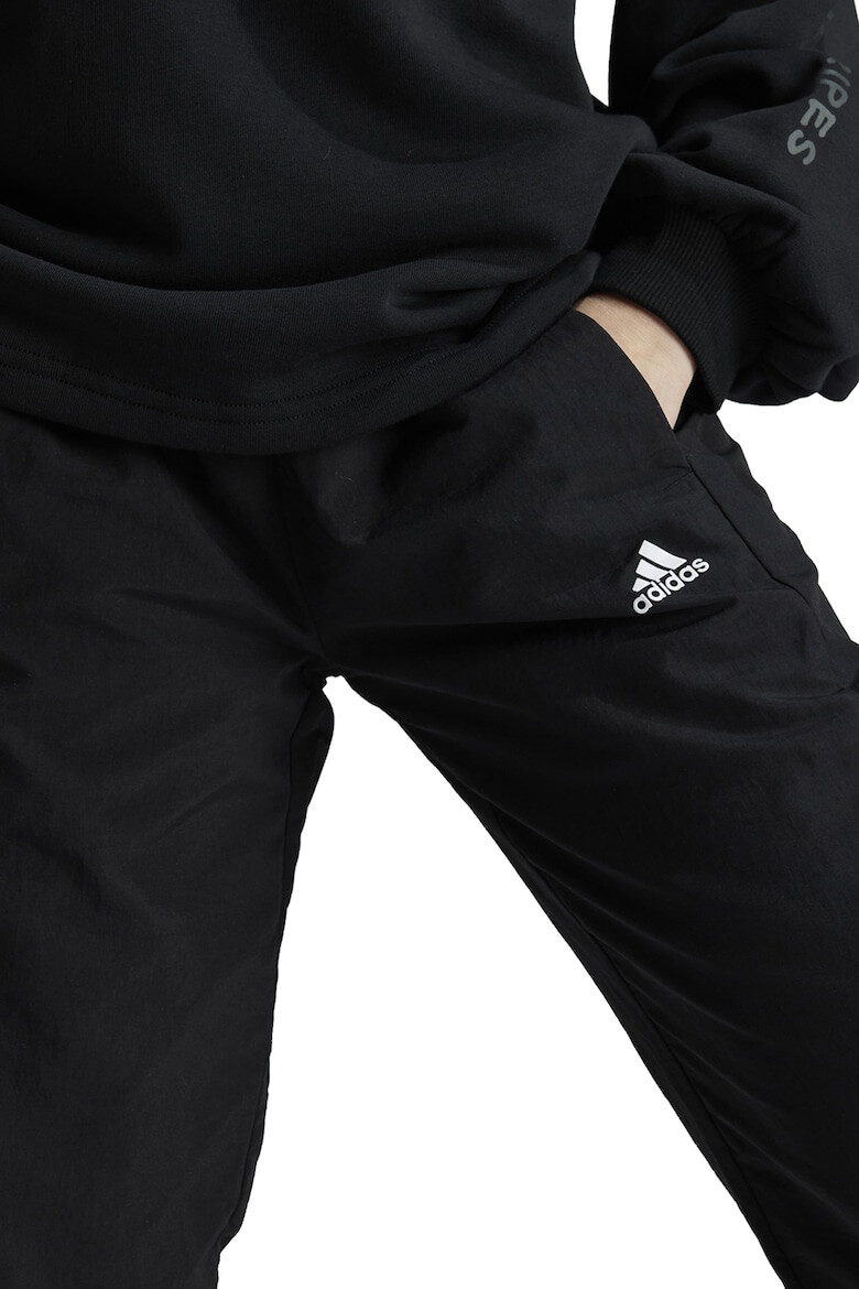 adidas Sportswear Pantaloni de trening cu buzunare laterale - Pled.ro