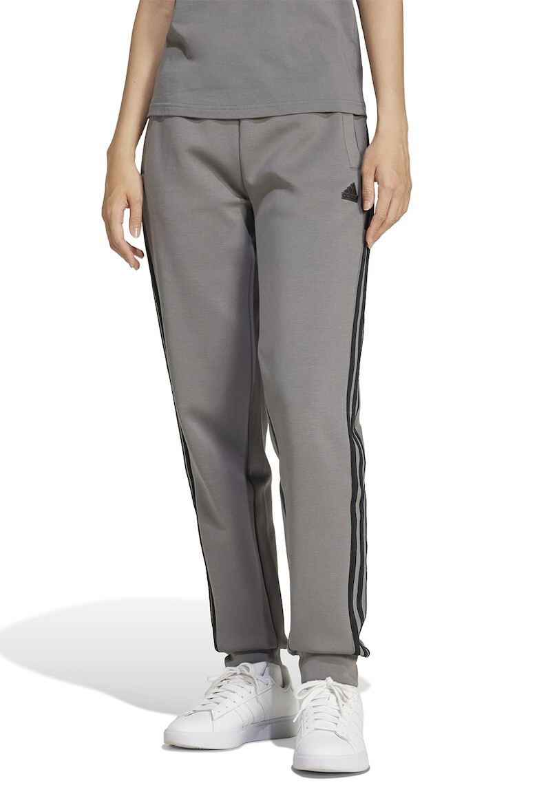 adidas Sportswear Pantaloni de trening cu buzunare laterale - Pled.ro