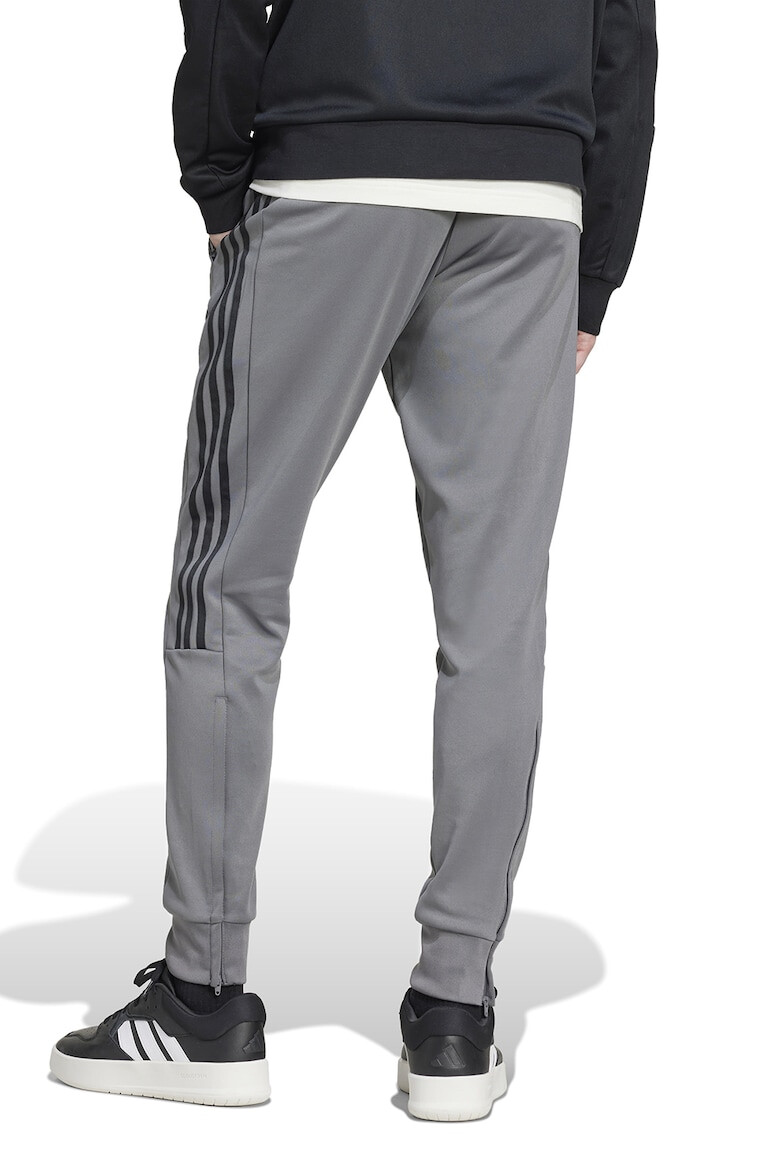 adidas Sportswear Pantaloni de trening cu fermoar la terminatie si buzunare - Pled.ro