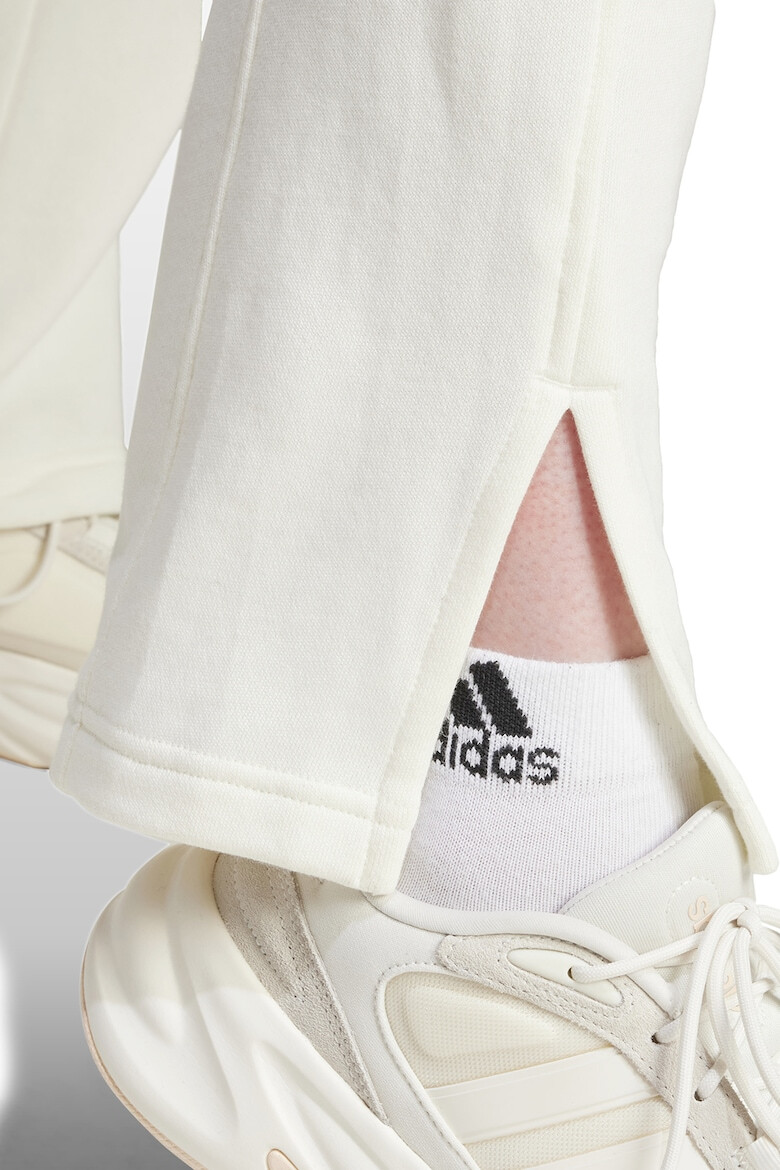 adidas Sportswear Pantaloni de trening din bumbac cu slituri laterale pe glezna - Pled.ro