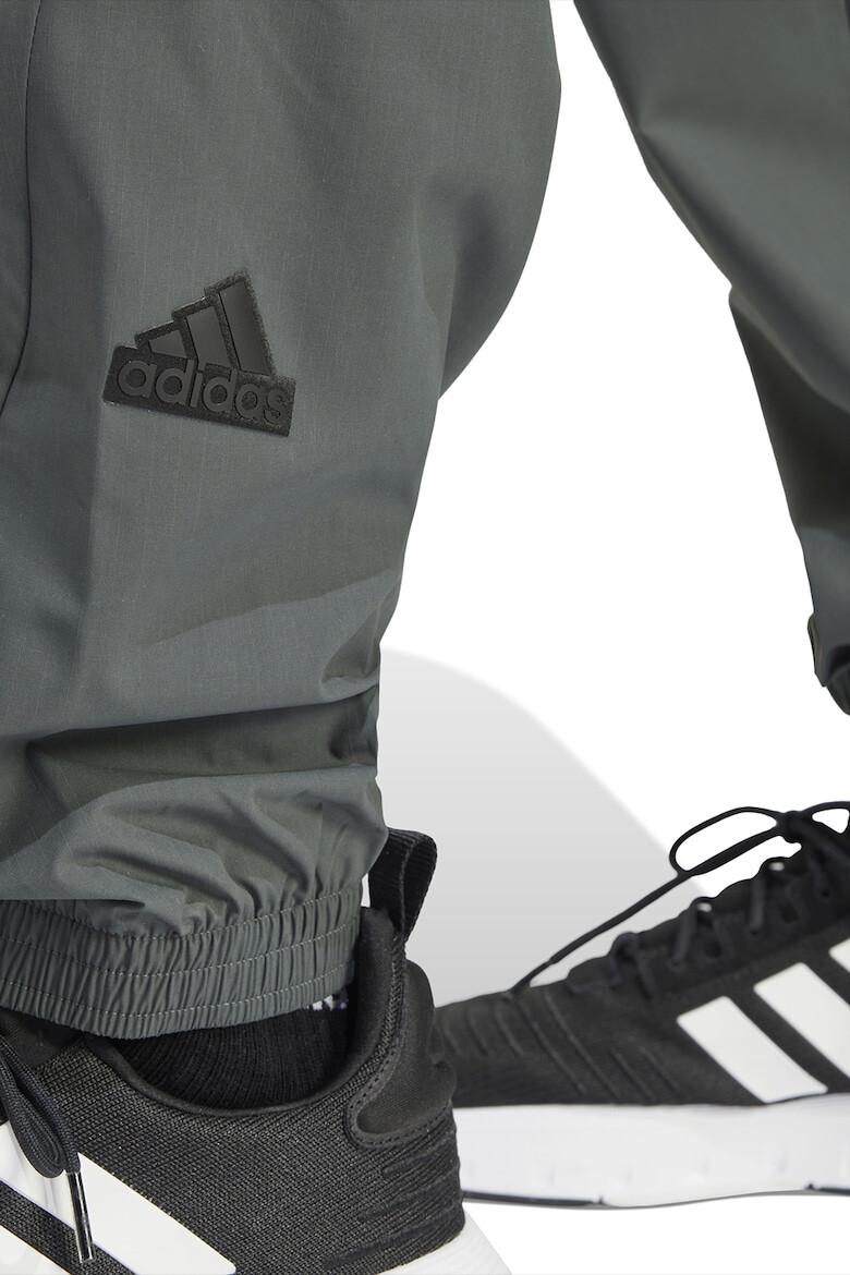 adidas Sportswear Pantaloni de trening rezistenti la vant Future Icons 3-Stripes - Pled.ro