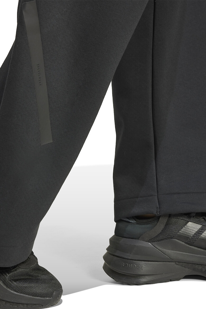 adidas Sportswear Pantaloni lejeri de trening cu buzunare cu fermoar Z.N.E. Bar - Pled.ro