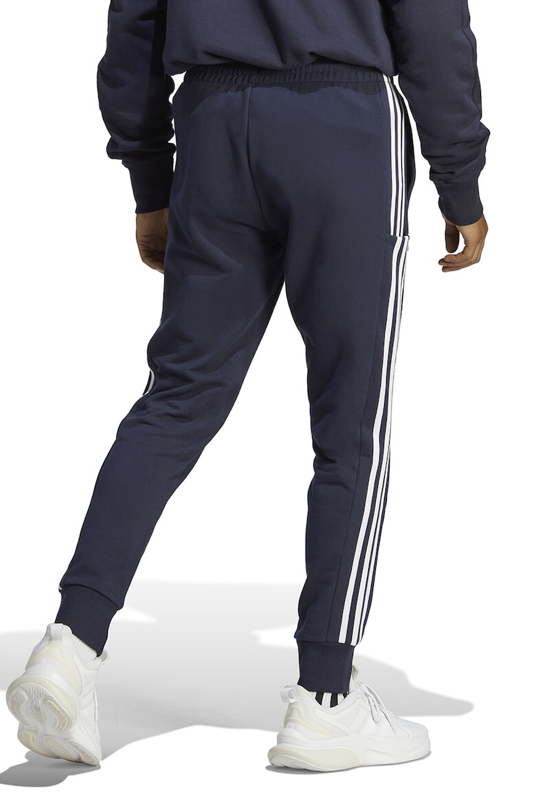 adidas Sportswear Pantaloni de trening cu buzunare laterale - Pled.ro