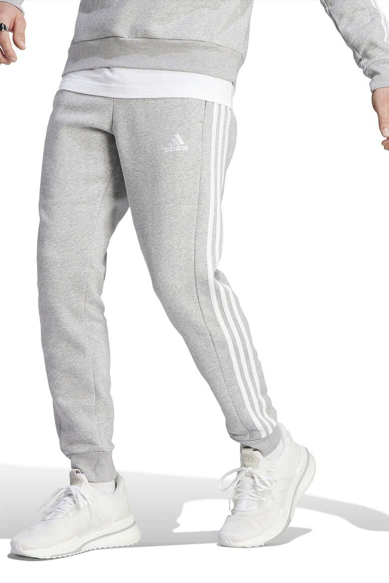 adidas Sportswear Pantaloni de trening conici cu buzunare laterale - Pled.ro