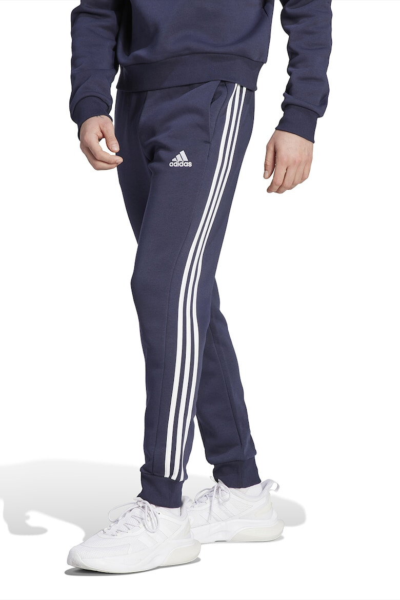 adidas Sportswear Pantaloni de trening conici cu buzunare laterale - Pled.ro