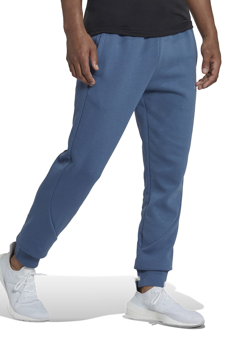 adidas Sportswear Pantaloni sport cu croiala conica si buzunare laterale M FL Recbos - Pled.ro