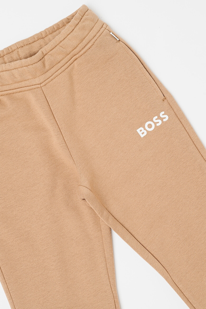 BOSS Kidswear Pantaloni de trening cu croiala conica si buzunare laterale - Pled.ro