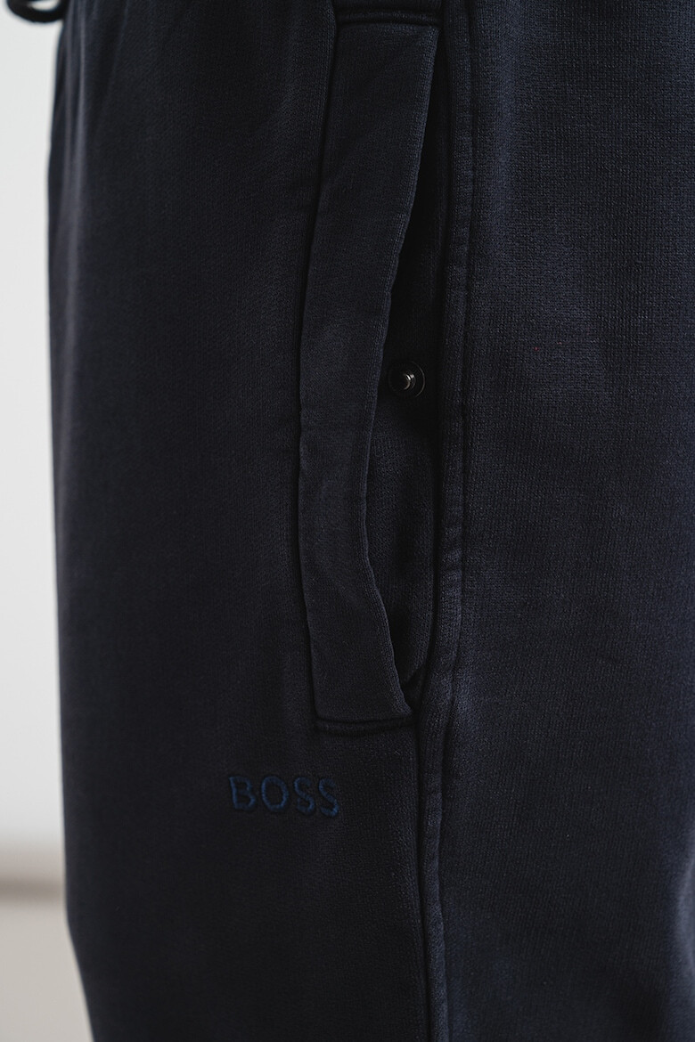 BOSS Pantaloni conici de trening - Pled.ro