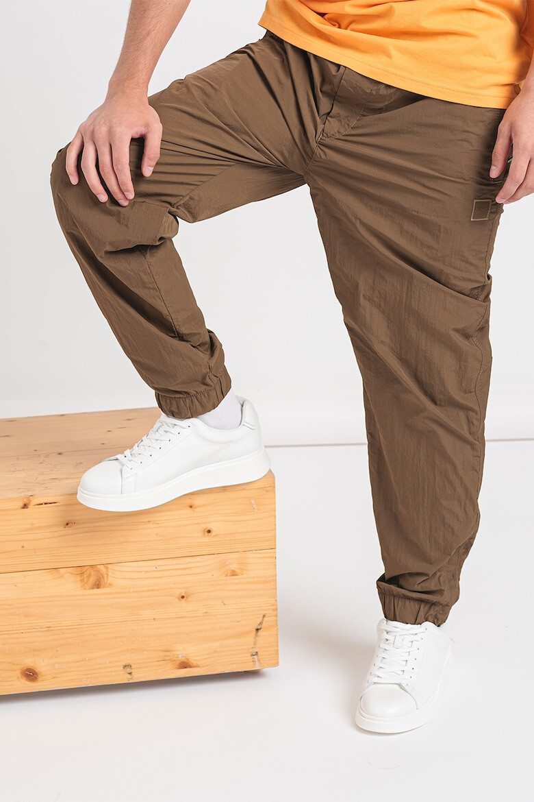 BOSS Pantaloni relaxed fit rezistenti la apa Sracky-2 - Pled.ro