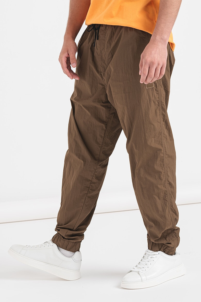 BOSS Pantaloni relaxed fit rezistenti la apa Sracky-2 - Pled.ro