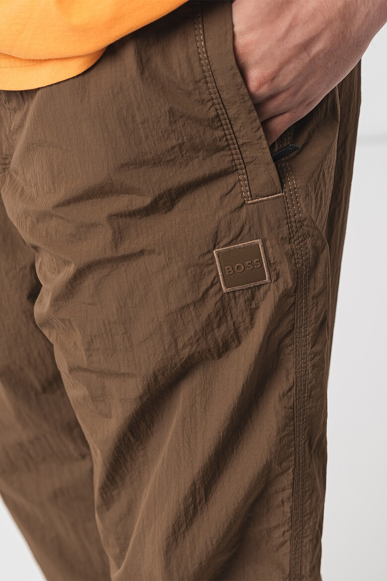 BOSS Pantaloni relaxed fit rezistenti la apa Sracky-2 - Pled.ro