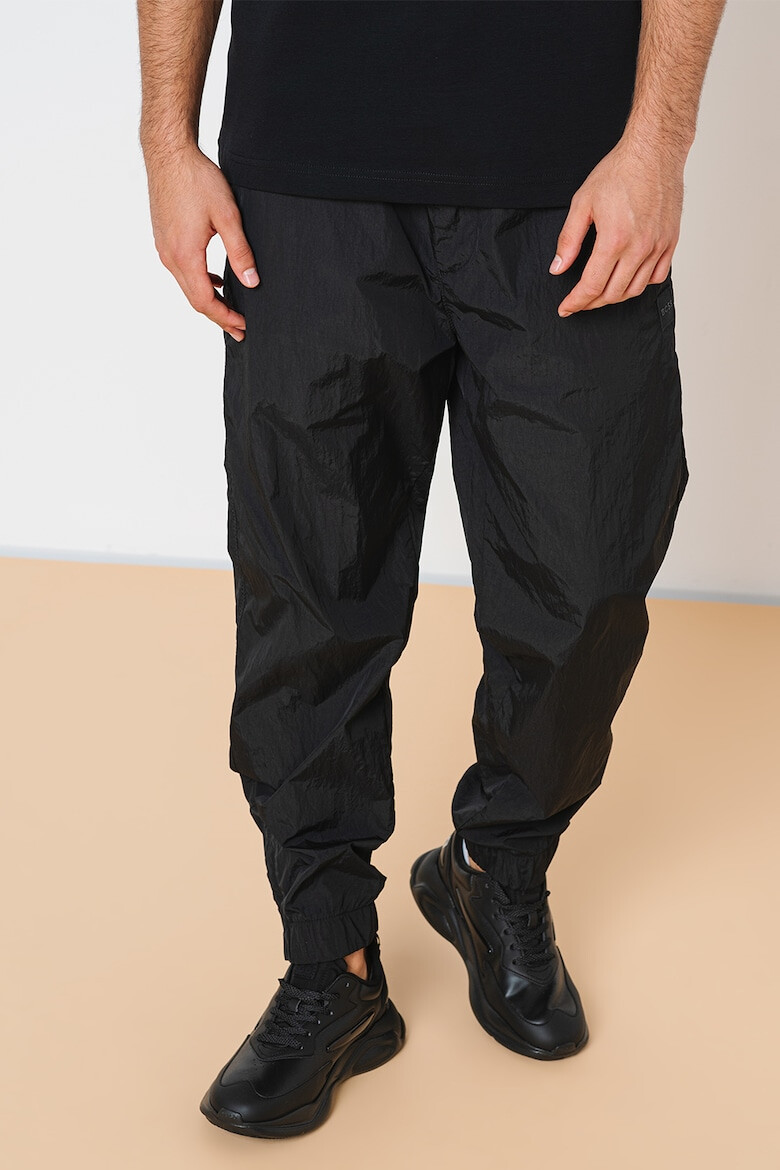 BOSS Pantaloni relaxed fit rezistenti la apa Sracky-2 - Pled.ro