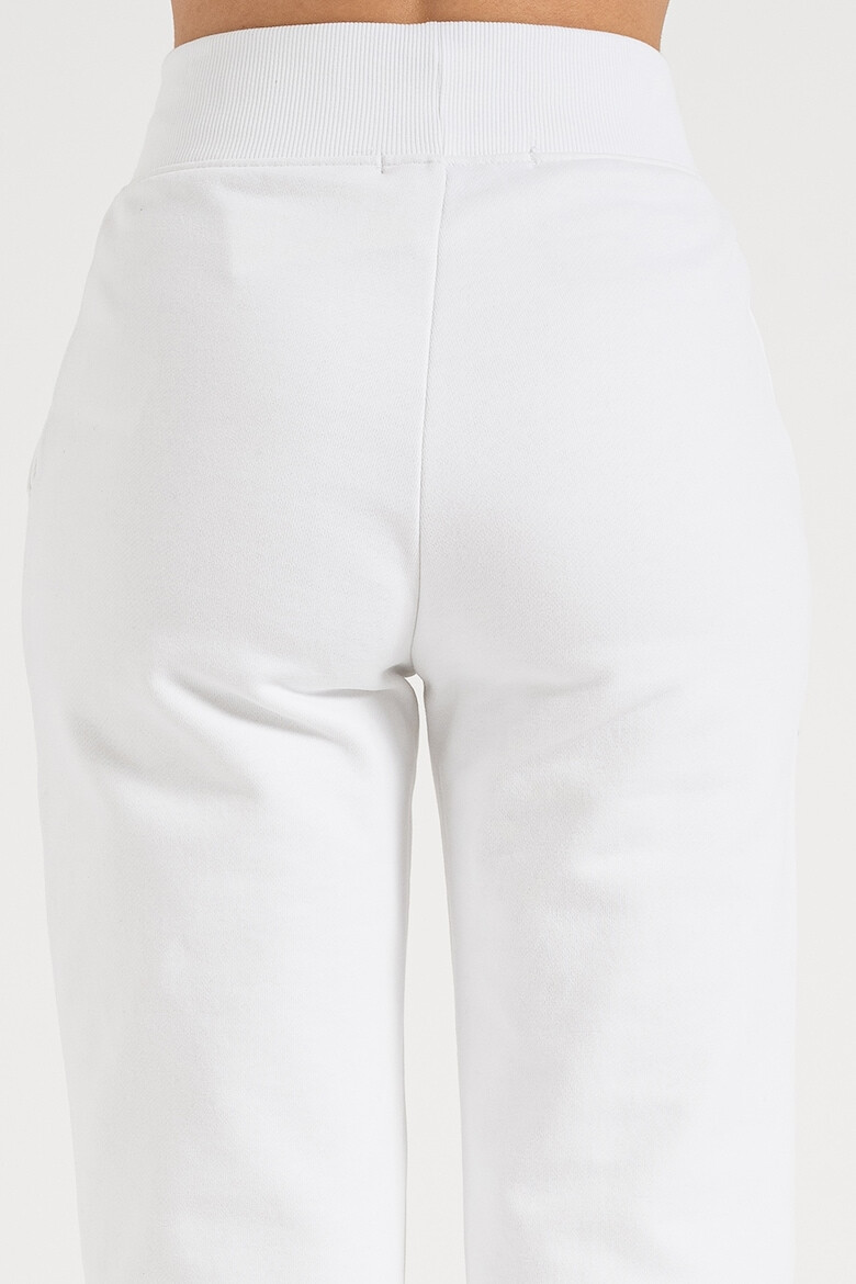 CALVIN KLEIN JEANS Pantaloni de trening cu slituri la terminatie - Pled.ro