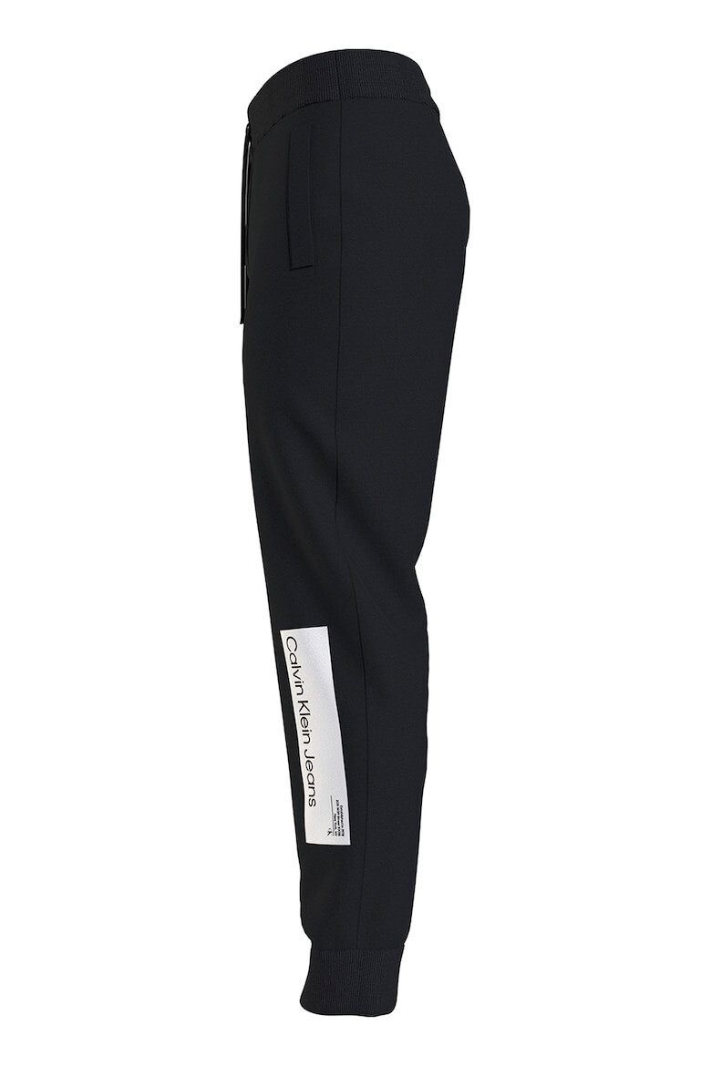 CALVIN KLEIN JEANS Pantaloni sport cu imprimeu logo - Pled.ro