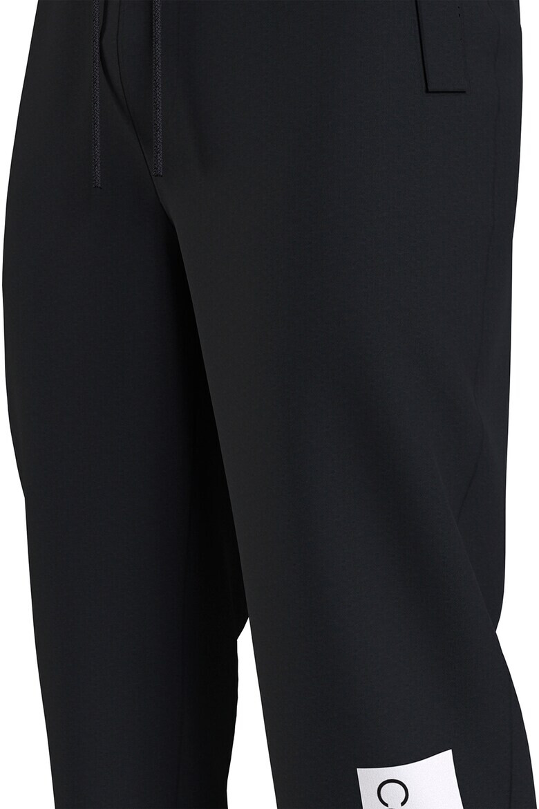 CALVIN KLEIN JEANS Pantaloni sport cu imprimeu logo - Pled.ro