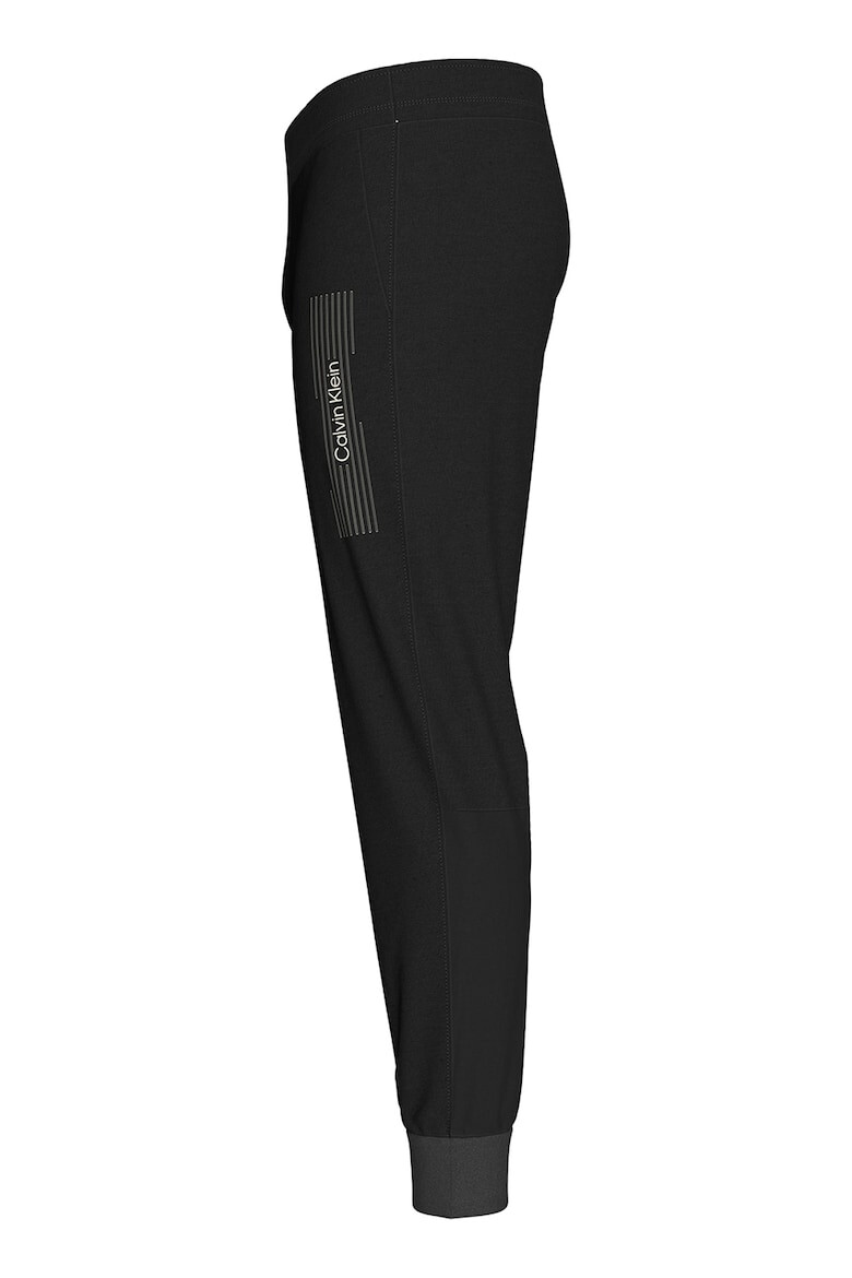 CALVIN KLEIN Pantaloni conici de trening - Pled.ro